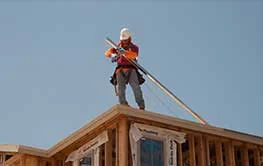 Man in the top of building